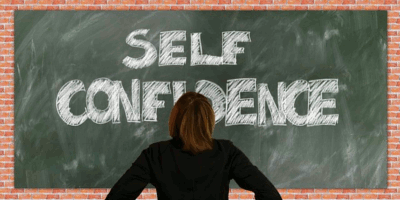 Blackboard with self confidence written on in words