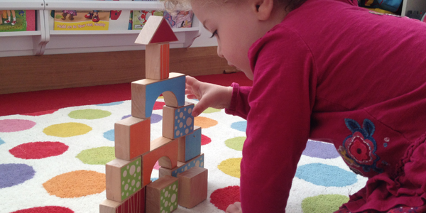 Young child with building blocks